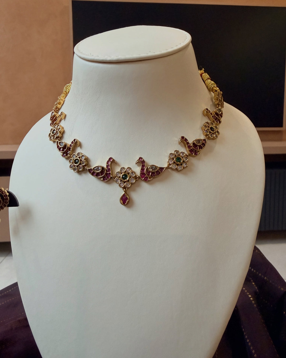 A graceful peacock necklace set featuring ruby stones, green accents… – KPK034 product image 3