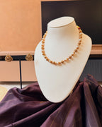 Timeless antique-gold detailing paired with elegant pearls—perfect… – KPK033 product image 3
